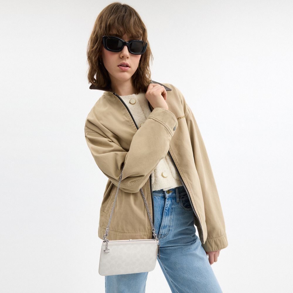 Pouch Bag In Signature Canvas