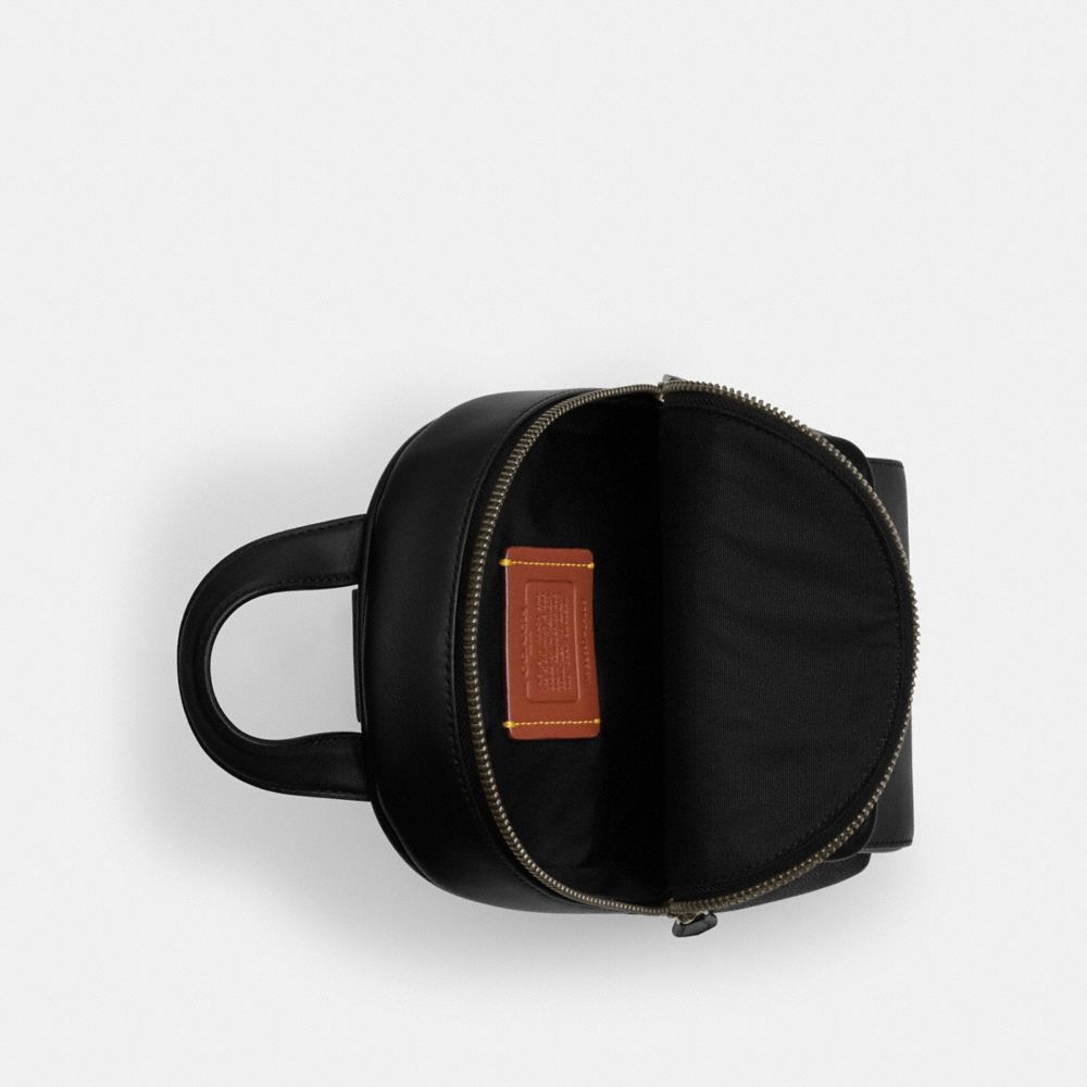 Small Turnlock Sling Pack In Signature Canvas