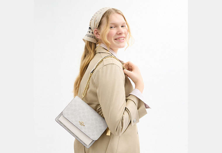 Klare Crossbody Bag In Signature Canvas