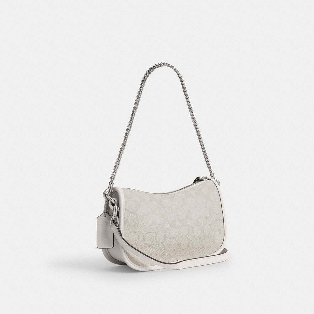 Disney X Coach Swinger Bag In Regenerative Leather With Mickey Mouse And Friends