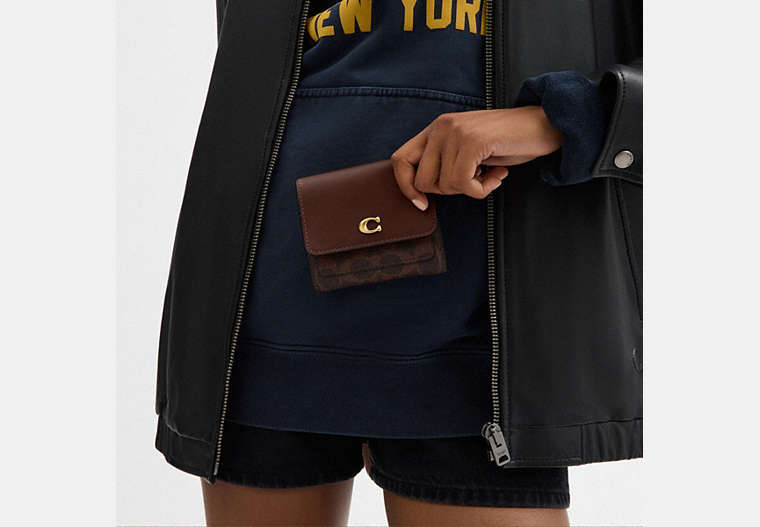 Mila Small Flap Wallet In Signature Canvas
