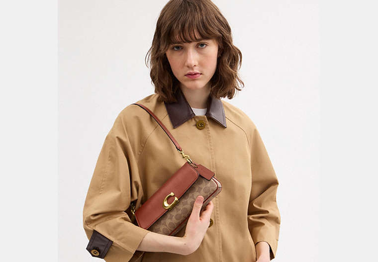 Jet Shoulder Bag In Signature Canvas