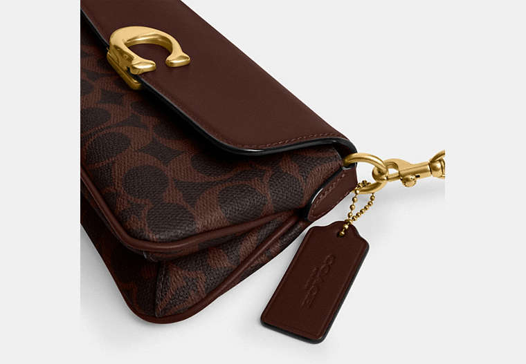 Jet Shoulder Bag In Signature Canvas