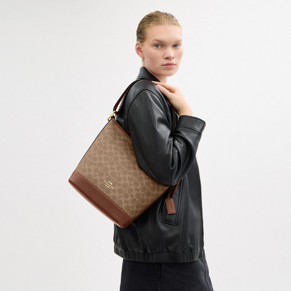 Jude Duffle Bag In Signature Canvas
