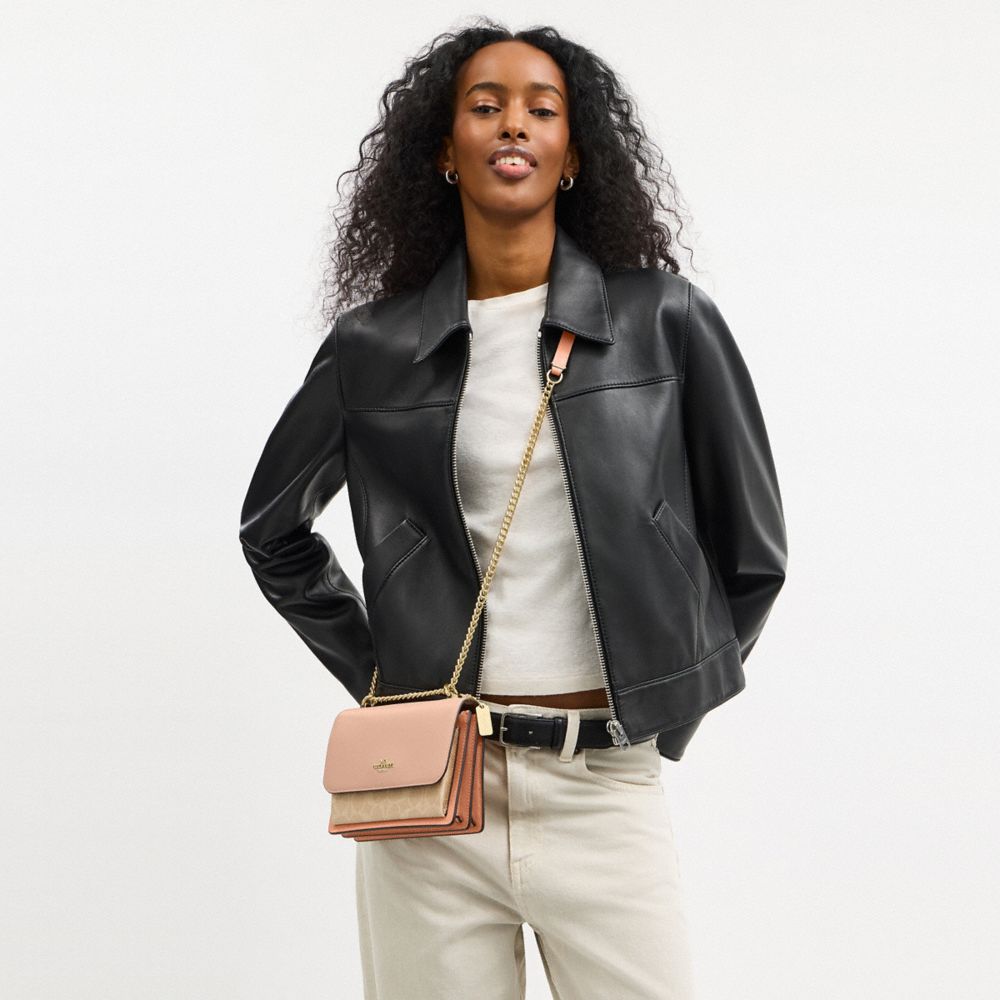 Mini Klare Crossbody Bag In Colorblock Signature Canvas