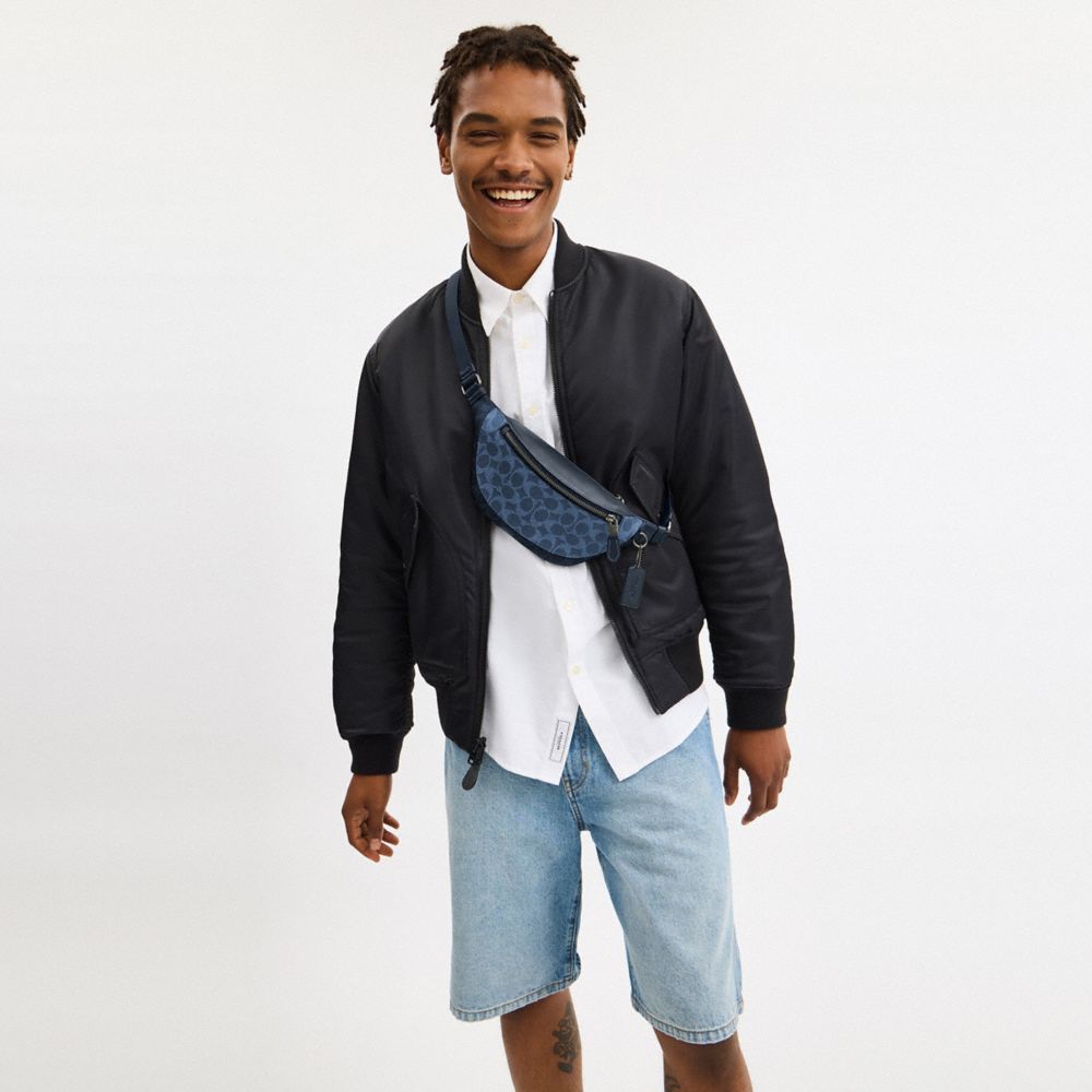 Warren Mini Belt Bag In Blocked Signature Canvas