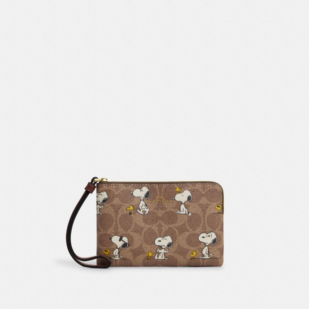 Coach X Peanuts Corner Zip Wristlet In Signature Canvas With Snoopy Print