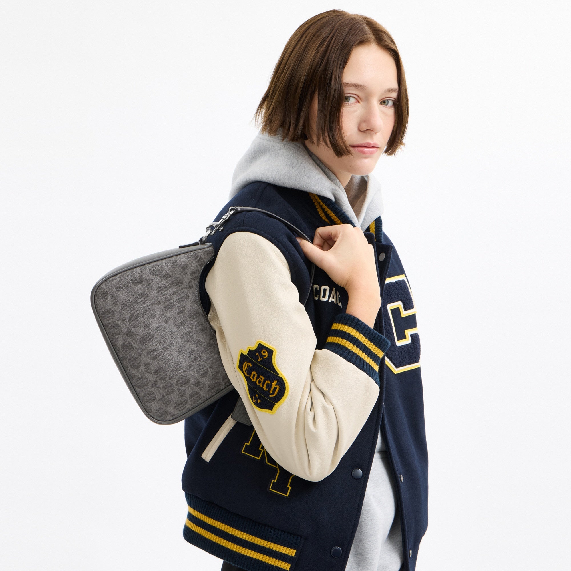 Nolan Hobo Bag In Signature Canvas