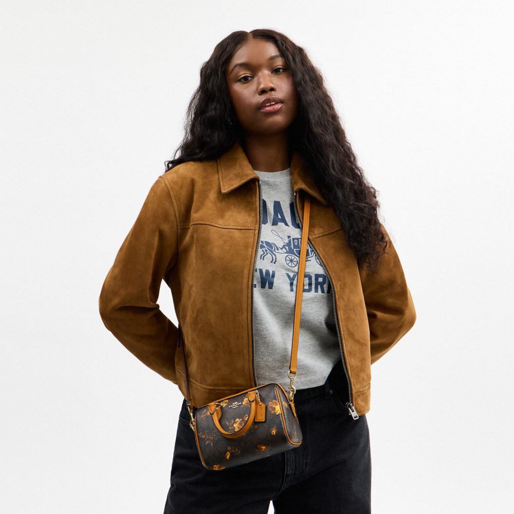 Mini Rowan Crossbody Bag In Signature Canvas With Floral Print