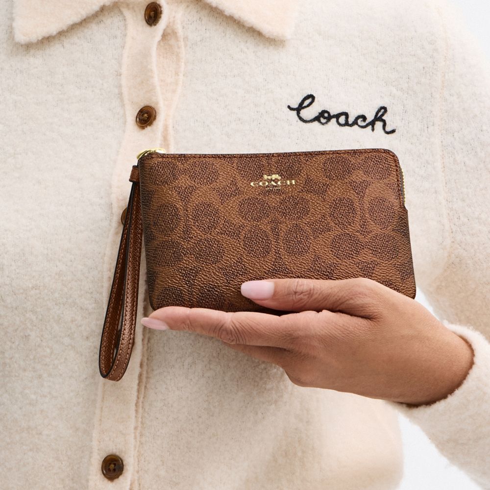 Corner Zip Wristlet In Signature Canvas