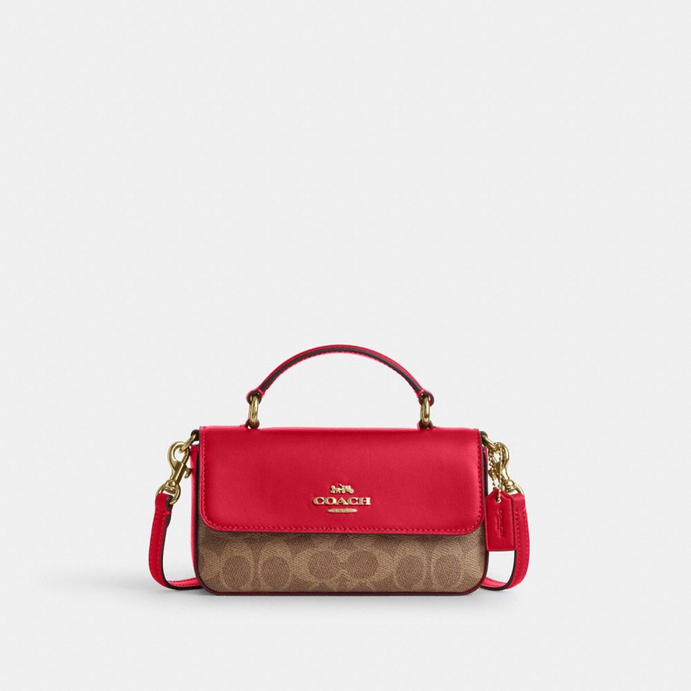 Mini Josie Top Handle Bag In Signature Canvas
