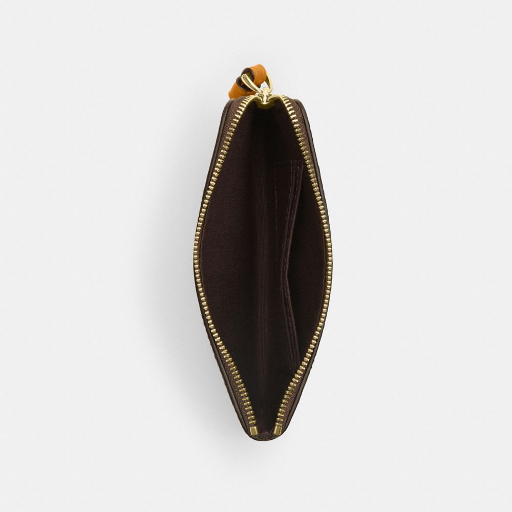 Corner Zip Wristlet In Signature Canvas With Floral Print