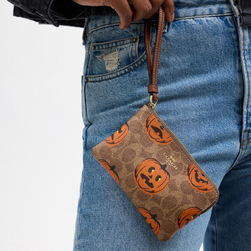 Corner Zip Wristlet In Signature Canvas With Halloween Print