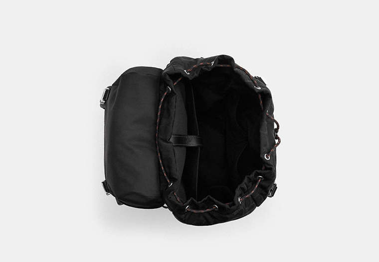 Logan Backpack In Signature Nylon With Charms