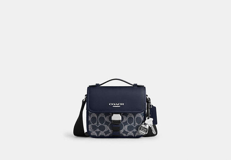 Racer Crossbody Bag In Signature Canvas With Charms