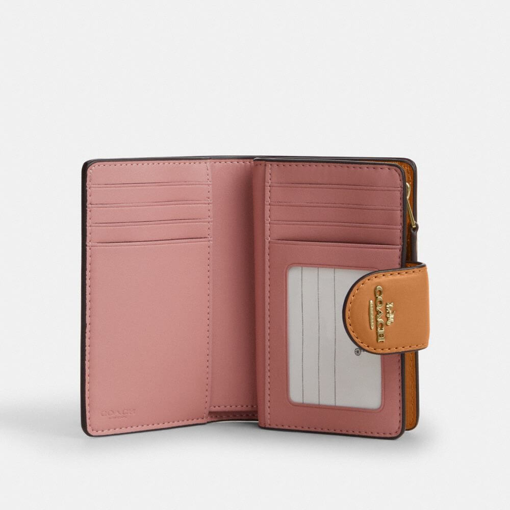 Medium Corner Zip Wallet In Signature Canvas