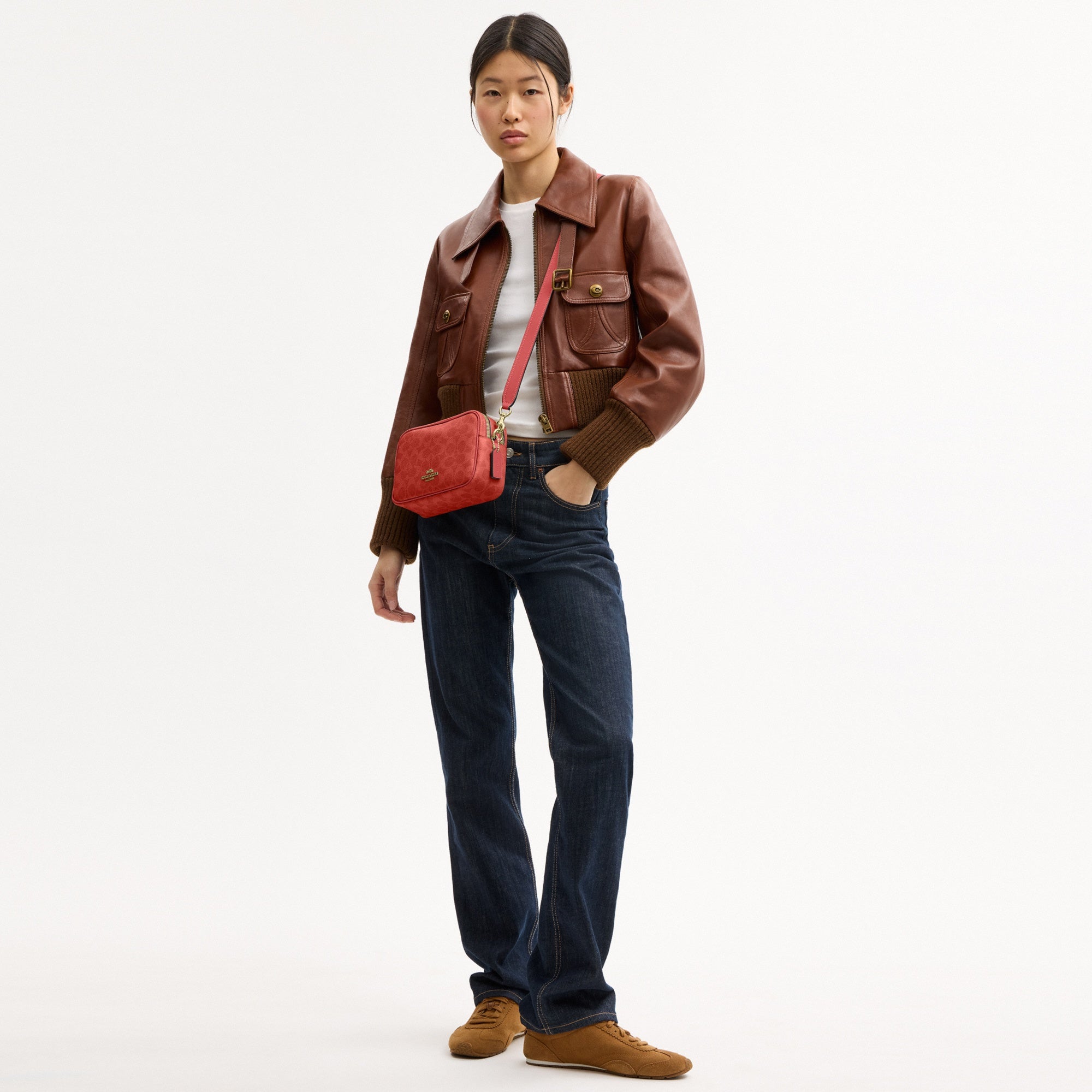 Mini Carey Crossbody Bag In Signature Canvas