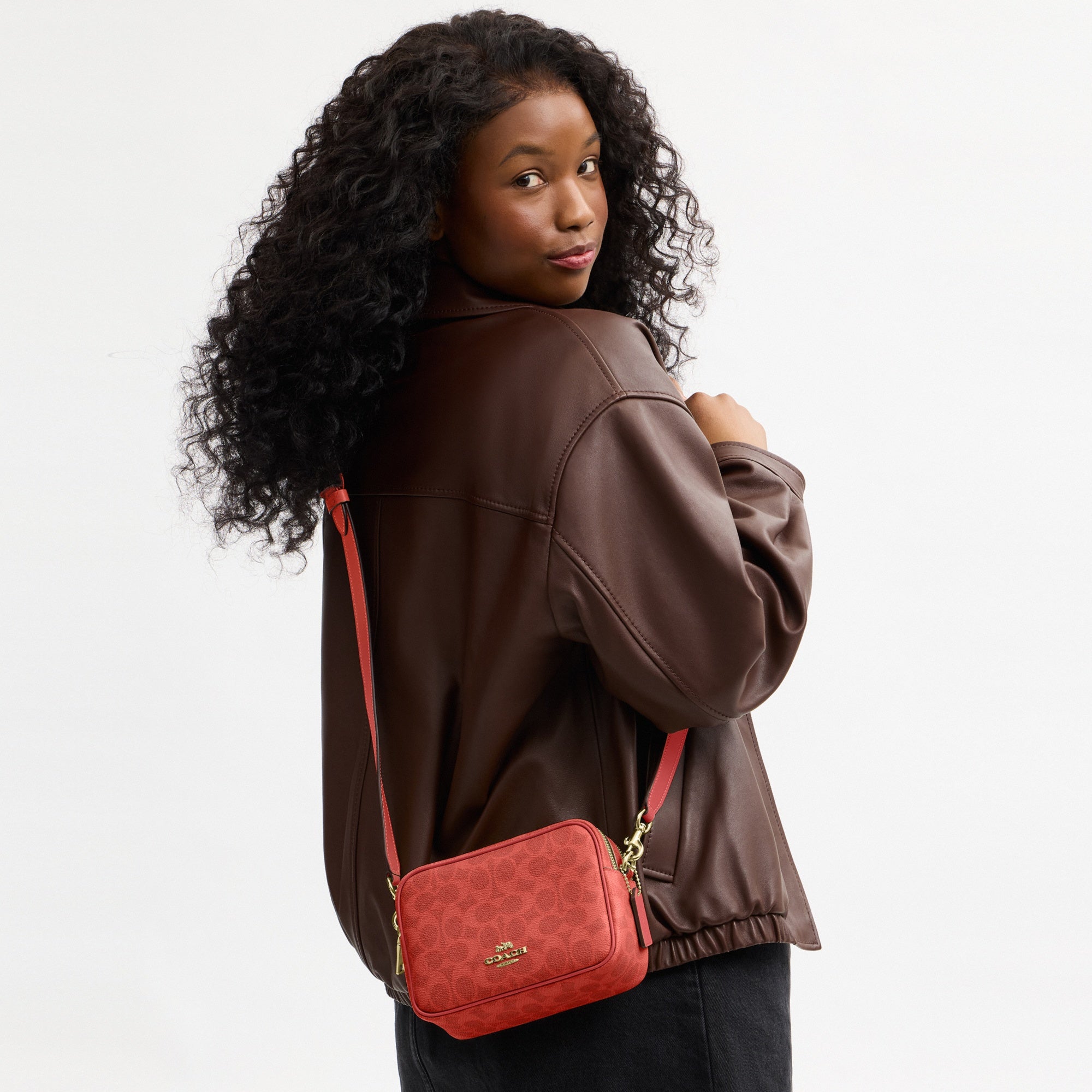 Mini Carey Crossbody Bag In Signature Canvas