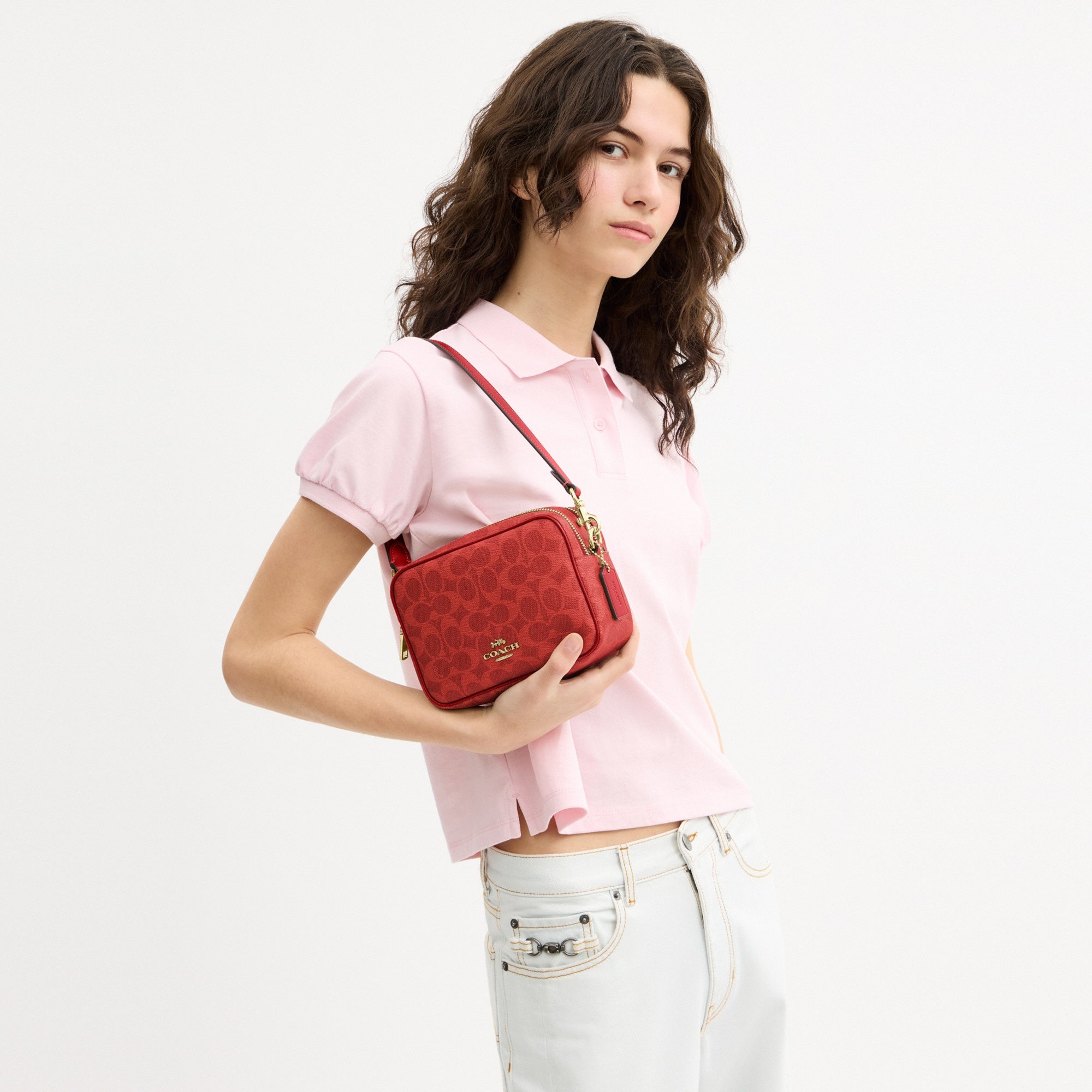 Mini Carey Crossbody Bag In Signature Canvas