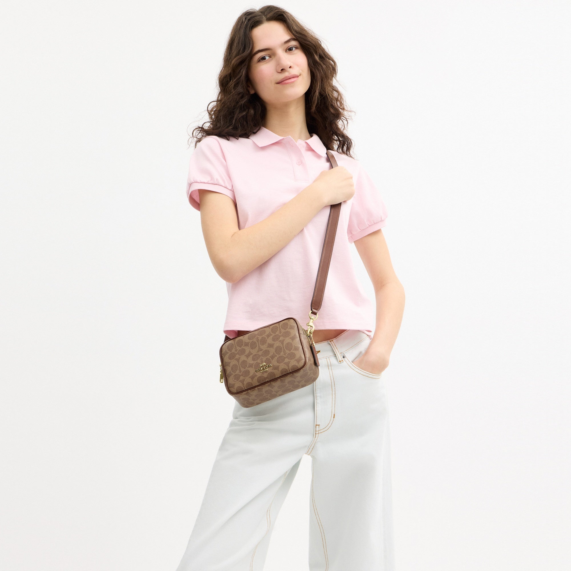 Mini Carey Crossbody Bag In Signature Canvas