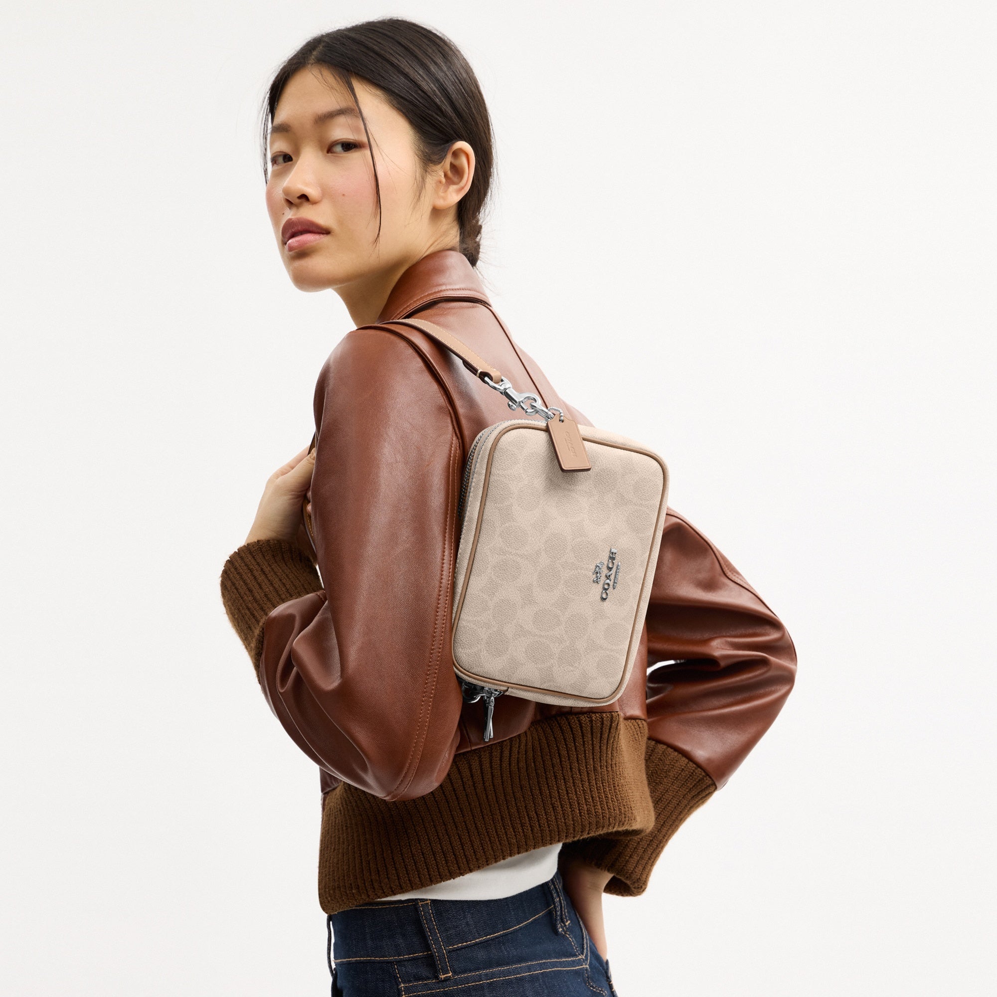 Mini Carey Crossbody Bag In Signature Canvas
