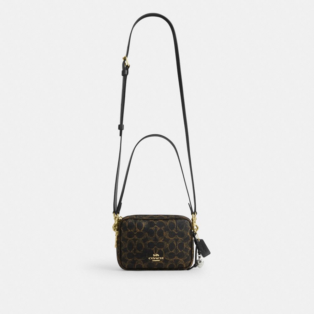 Mini Carey Crossbody Bag In Loved Signature Canvas