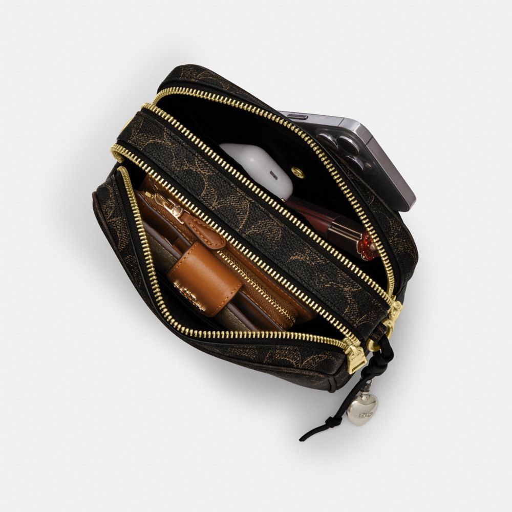 Mini Carey Crossbody Bag In Loved Signature Canvas
