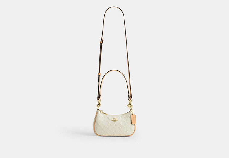 Teri Mini Crossbody Bag In Signature Leather