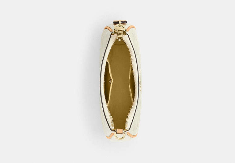 Teri Mini Crossbody Bag In Signature Leather