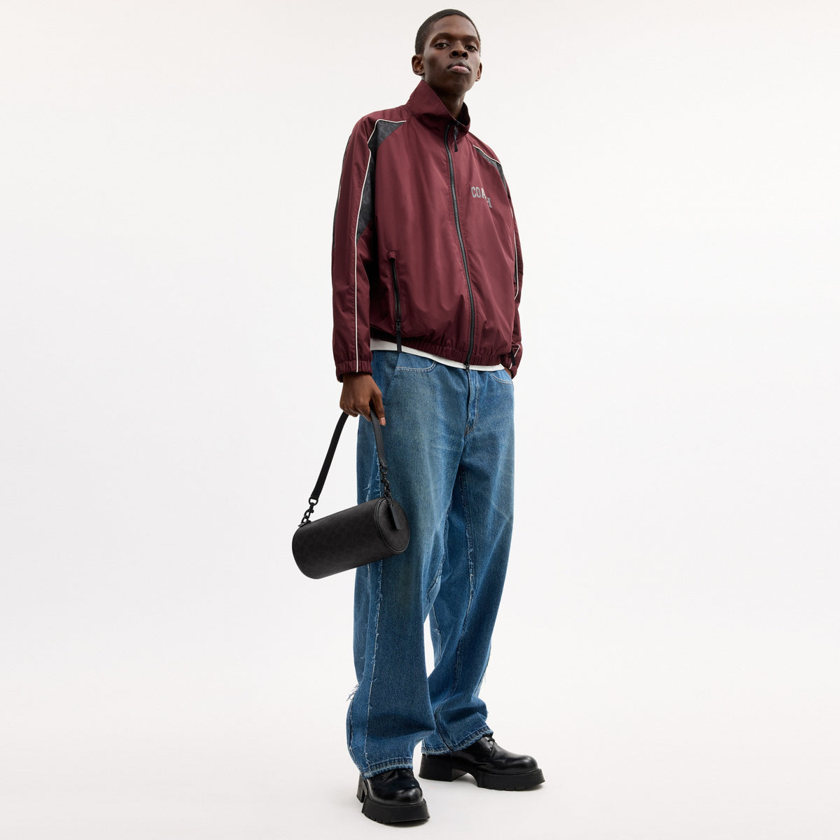 Andre Barrel Bag 24 In Signature Canvas