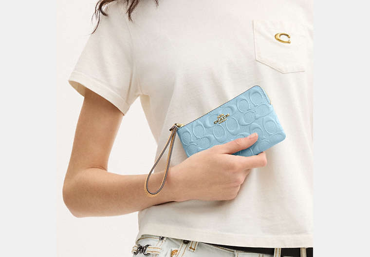 Corner Zip Wristlet In Signature Leather