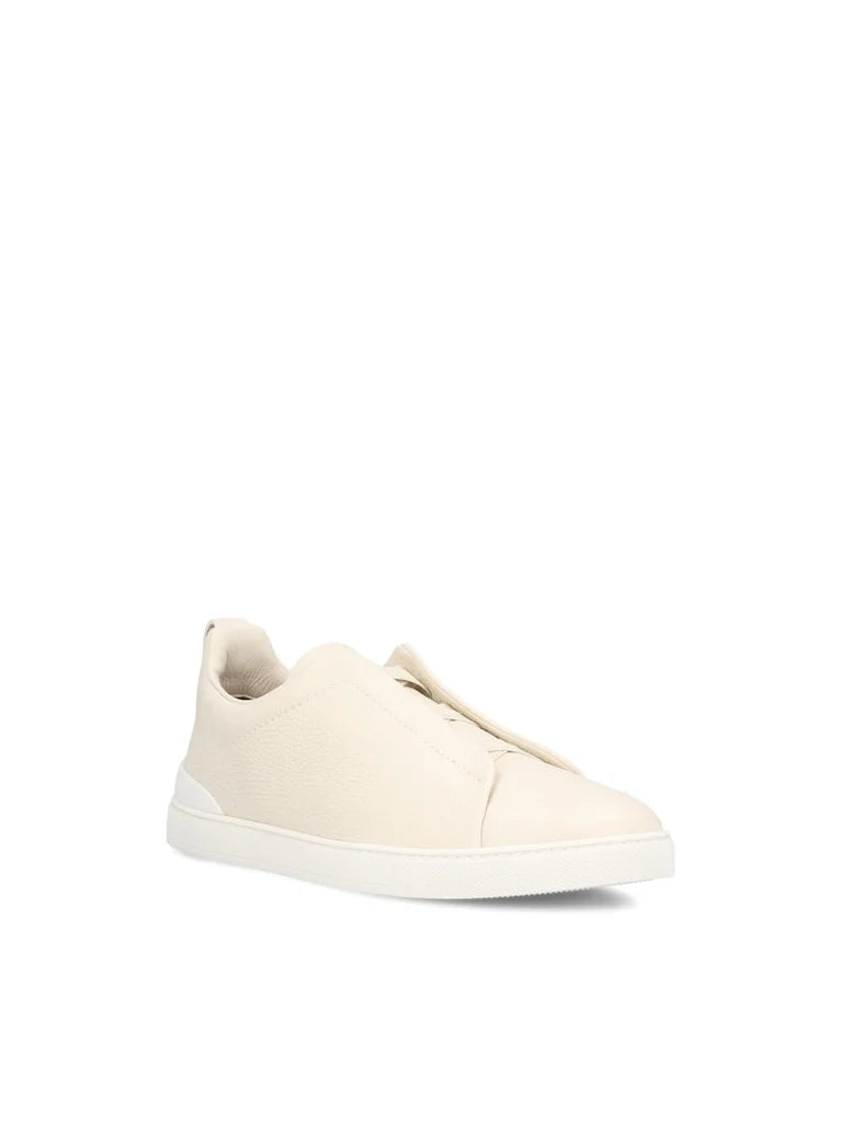 Zegna Men’s Triple Stitch™ White Deerskin Slip-On Sneakers – Made in Italy | Iconic Luxury Footwear