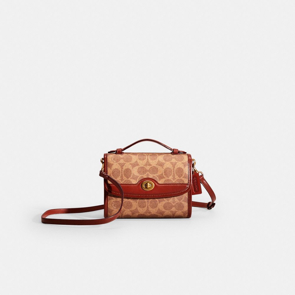 Restored Kip Turnlock Crossbody In Signature Canvas