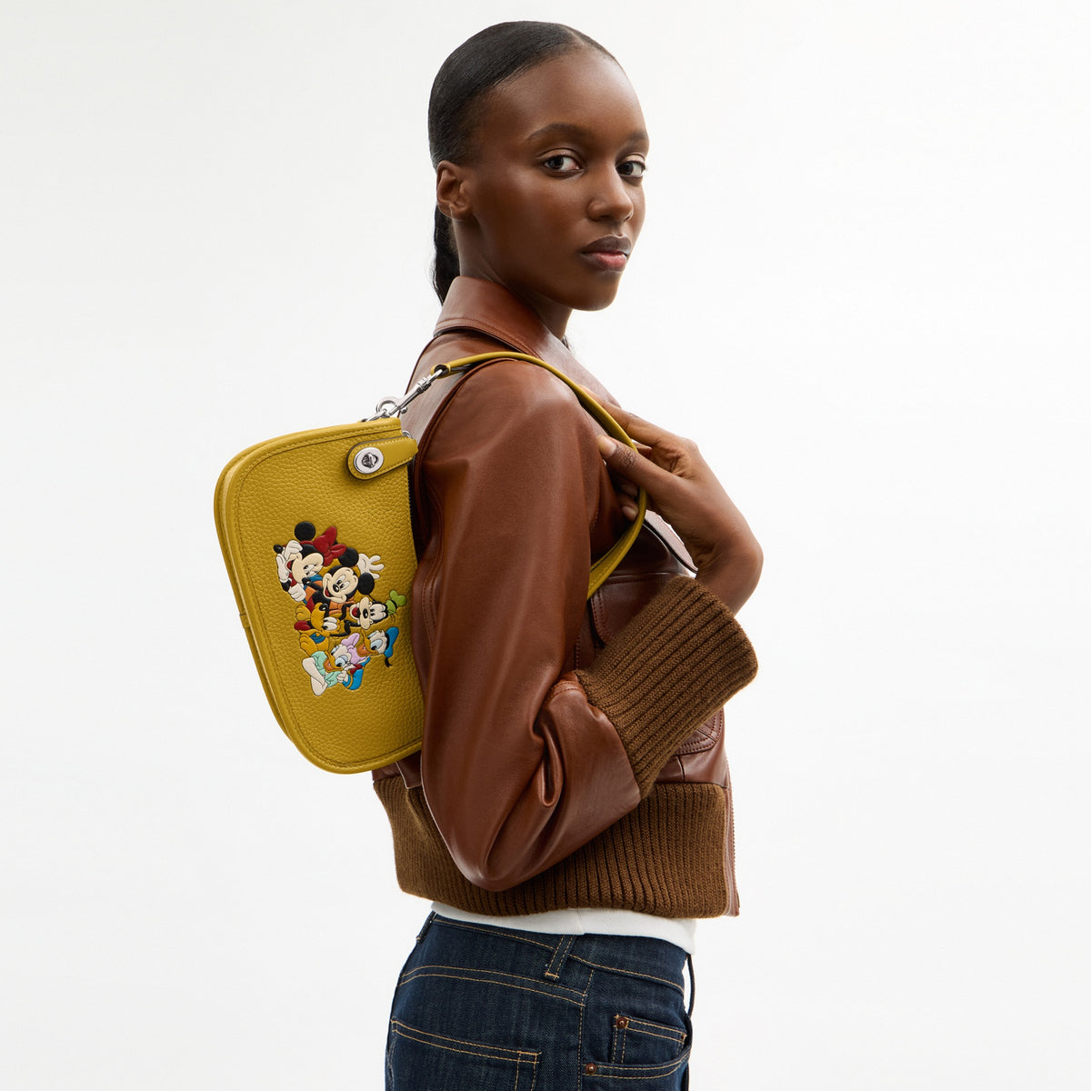 Disney X Coach Swinger Bag In Regenerative Leather With Mickey Mouse And Friends