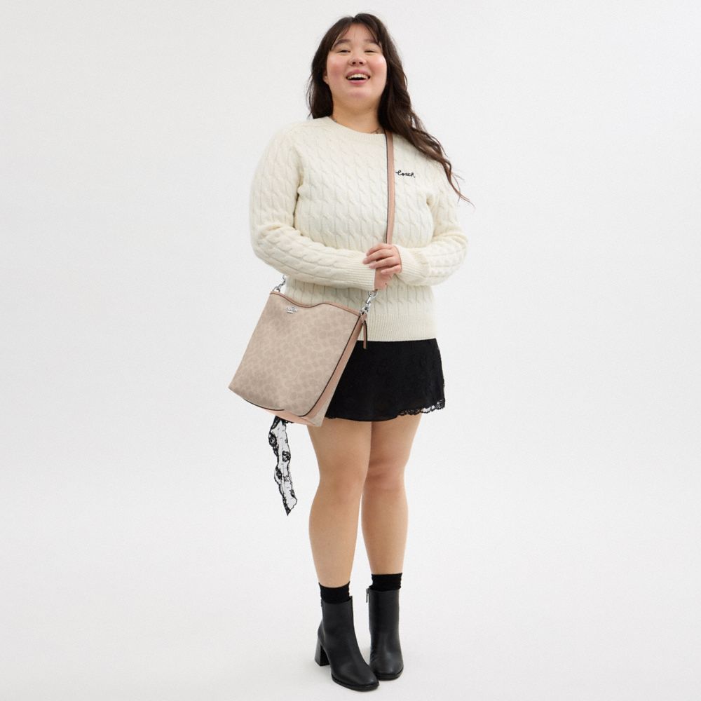 City Large Bucket Bag In Signature Canvas