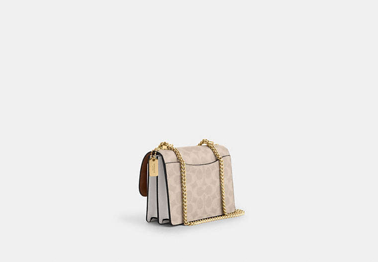 Mini Klare Crossbody Bag In Signature Canvas