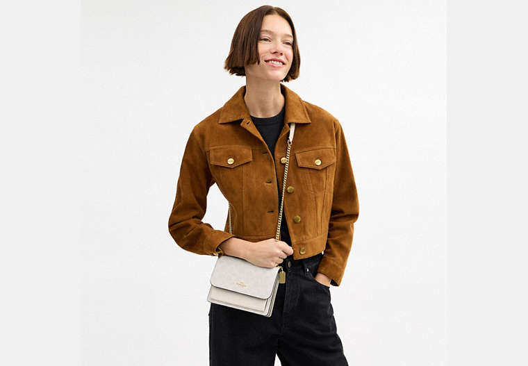 Mini Klare Crossbody Bag In Signature Canvas