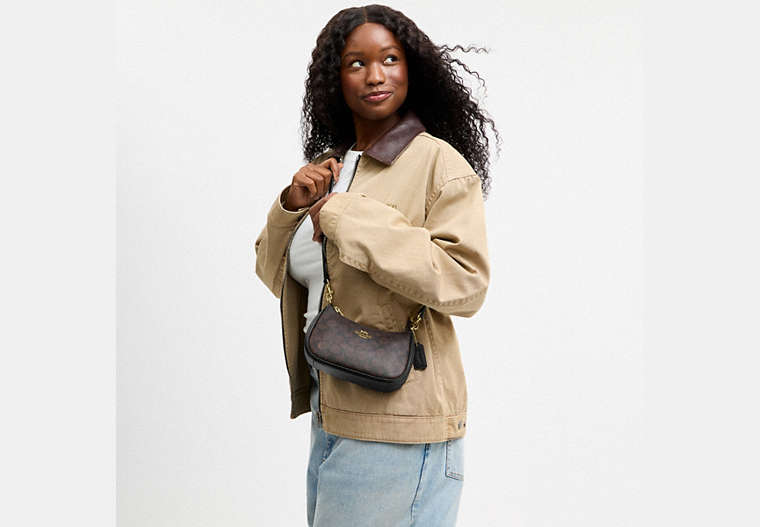 Teri Mini Crossbody Bag In Signature Canvas