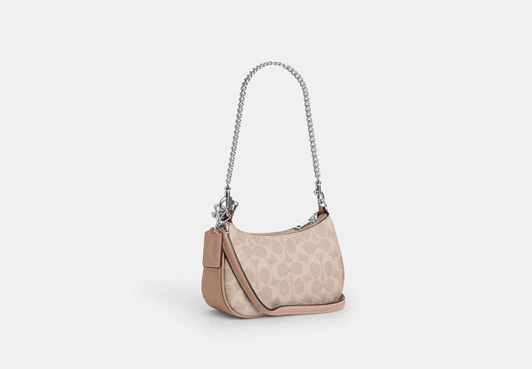 Teri Mini Crossbody Bag In Signature Canvas