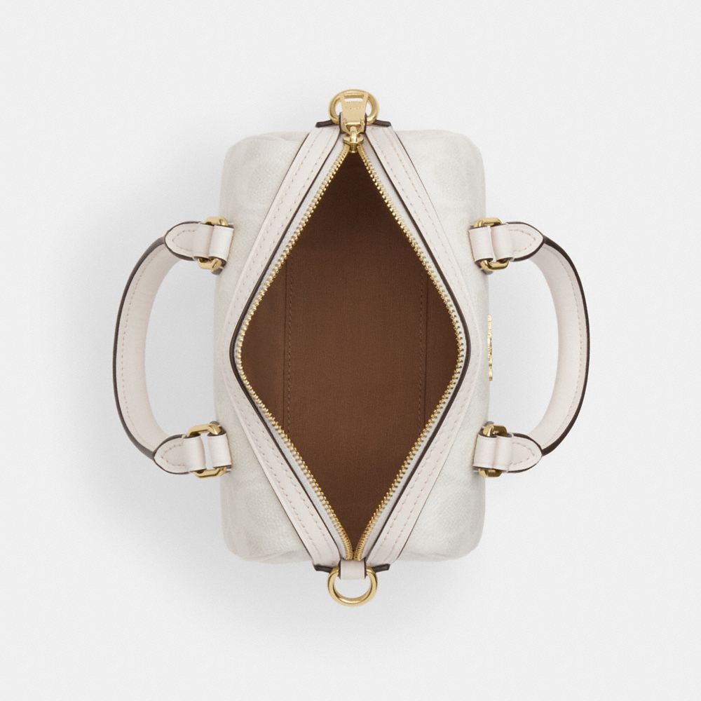 Mini Rowan Crossbody Bag In Signature Canvas
