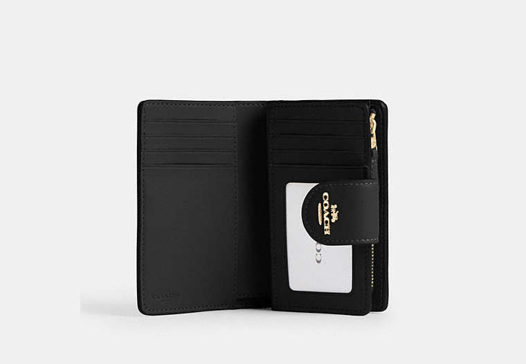 Medium Corner Zip Wallet In Signature Canvas