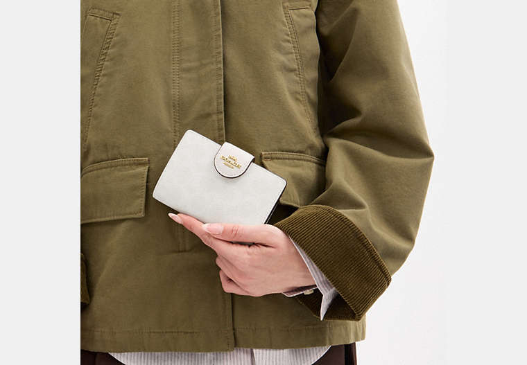 Medium Corner Zip Wallet In Signature Canvas
