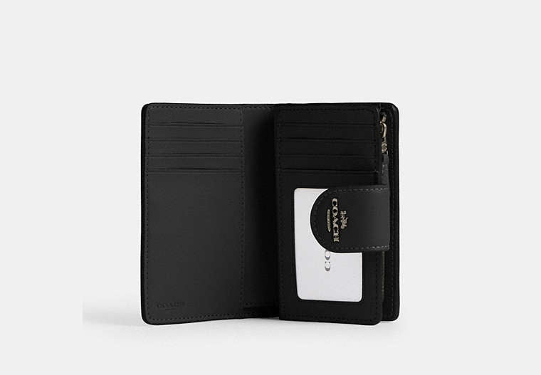 Medium Corner Zip Wallet In Signature Canvas