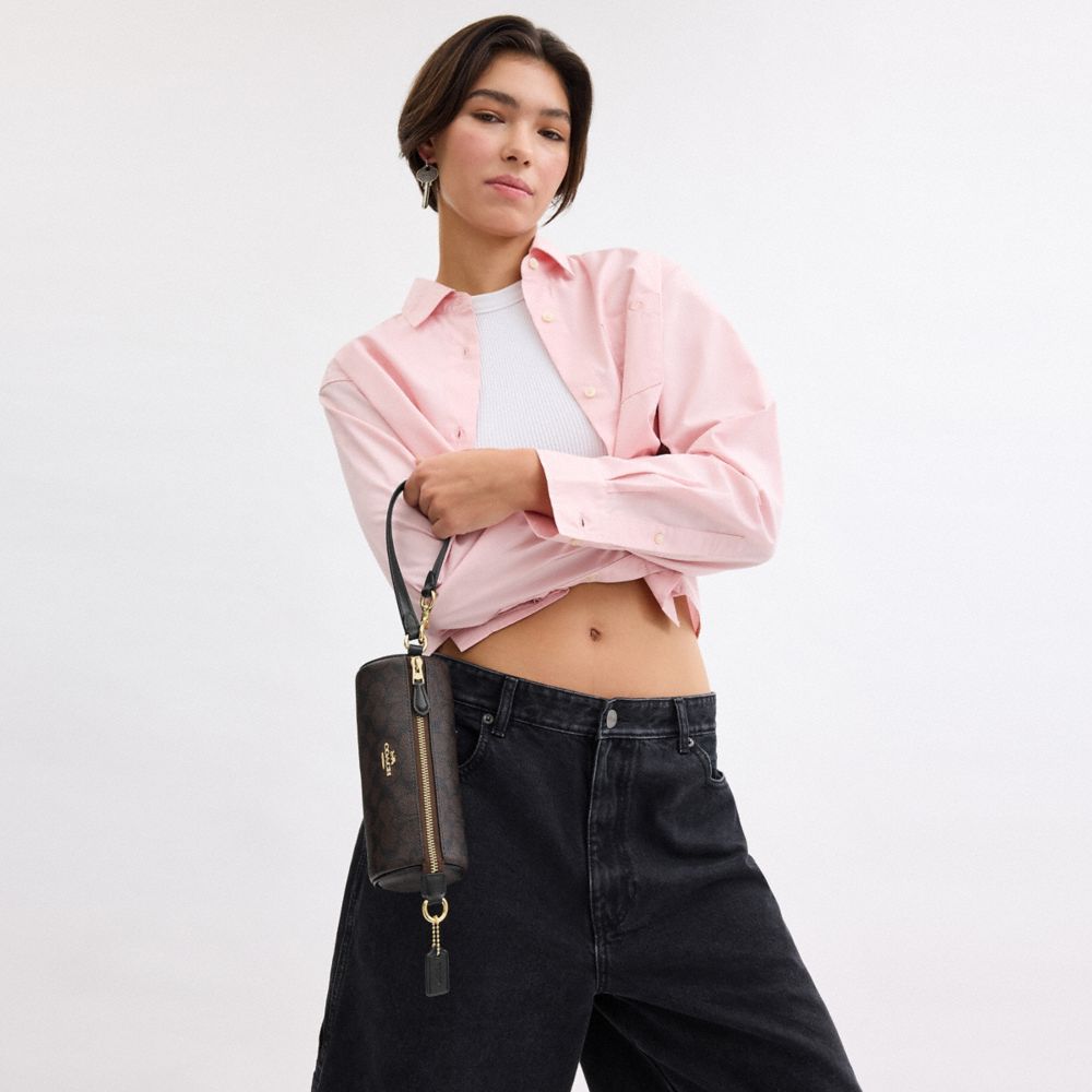 Nolita Barrel Bag In Signature Canvas