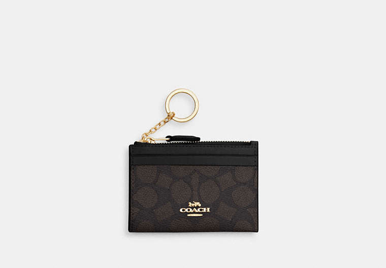 Mini Skinny Id Case In Signature Canvas