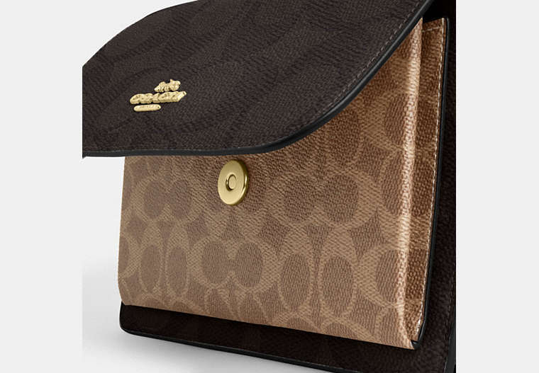 Klare Crossbody Bag In Blocked Signature Canvas