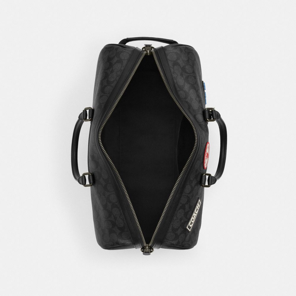 Venturer Bag In Signature Canvas With Patches