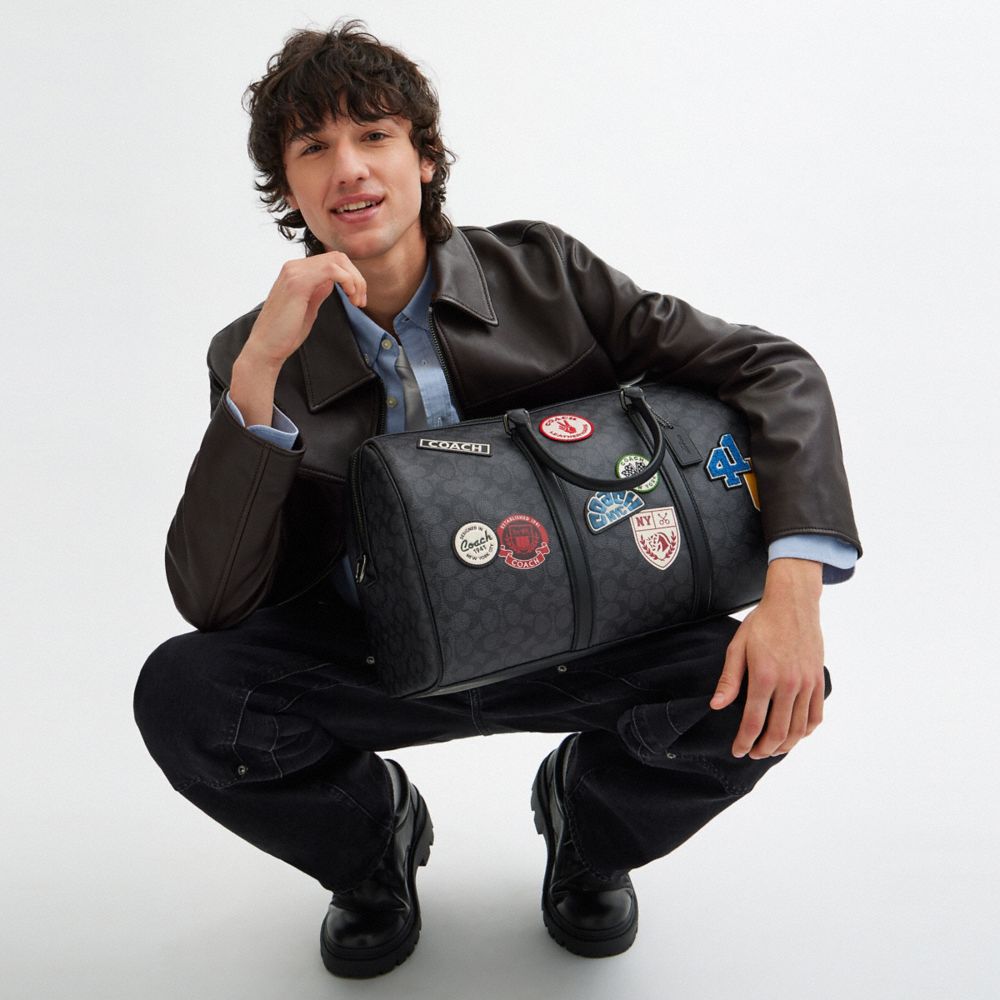 Venturer Bag In Signature Canvas With Patches