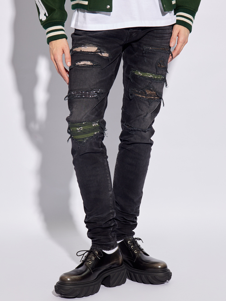 Amiri Bandana Camo Thrasher Jeans in Faded Black