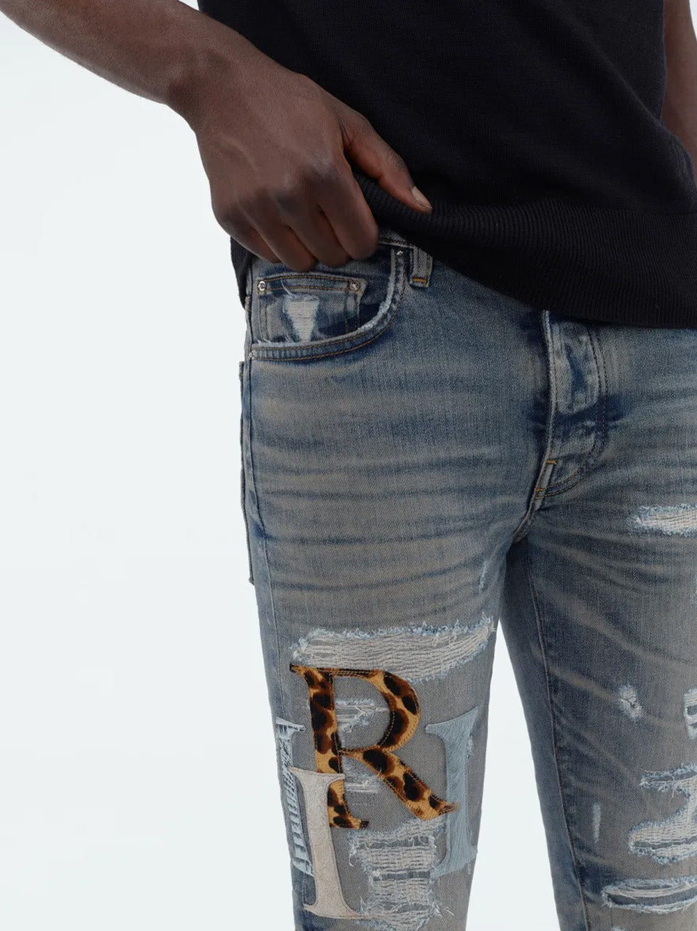 Amiri Leather Staggered Logo Jeans in Blue